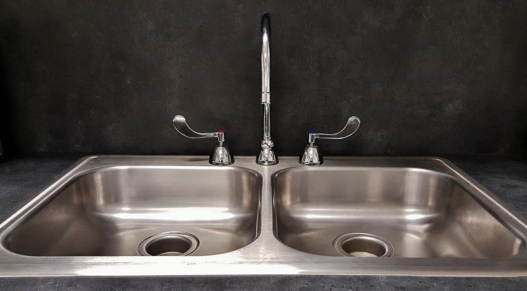 How to Unclog a Double Kitchen Sink With Standing Water